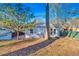 Landscaped backyard with patio and large trees at 369 Bell Se St, Marietta, GA 30060