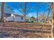 Large backyard with mature trees and a detached workshop at 369 Bell Se St, Marietta, GA 30060
