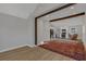 Open living room features a large area rug and view into the kitchen at 369 Bell Se St, Marietta, GA 30060