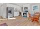 Modern kitchen with white cabinets, stainless steel appliances, and breakfast nook at 369 Bell Se St, Marietta, GA 30060