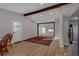 Open living area with hardwood floors and a large rug at 369 Bell Se St, Marietta, GA 30060