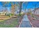 Pathway leading to a white cottage style shed at 369 Bell Se St, Marietta, GA 30060
