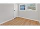 Bright bedroom with light wood flooring and neutral walls at 369 Bell Se St, Marietta, GA 30060