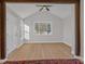 Bright living room with large window and hardwood floors at 369 Bell Se St, Marietta, GA 30060