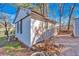 White cottage style shed with brown shutters at 369 Bell Se St, Marietta, GA 30060