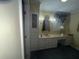 Bathroom with vanity, mirror, and built in storage at 3656 Rainbow Cir, Snellville, GA 30039