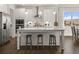 Modern kitchen with large island and stainless steel appliances at 3836 Kastler Dr, South Fulton, GA 30349