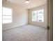 Bright bedroom with carpet and two windows at 3864 Kastler Dr, South Fulton, GA 30349