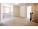 Spacious loft area with carpet and wrought iron railing at 3864 Kastler Dr, South Fulton, GA 30349