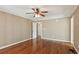 Spacious bedroom with hardwood floors and ceiling fan at 1201 Keencheefoonee Rd, Rutledge, GA 30663