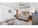 Large main bedroom with king-size bed, wood floors and barn door at 4020 Brookwood Ter, Mcdonough, GA 30253