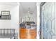 Bright entryway with hardwood floors and view into living room at 4020 Brookwood Ter, Mcdonough, GA 30253