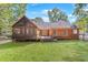 Brick house with deck, screened porch, and yard at 4020 Brookwood Ter, Mcdonough, GA 30253
