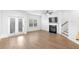 Spacious living room with fireplace and hardwood floors at 1958 Dillon Dr, Lithonia, GA 30058