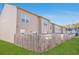 Private backyard with wooden fence and grassy area at 1958 Dillon Dr, Lithonia, GA 30058