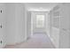Spacious walk-in closet with ample shelving and hanging space at 1958 Dillon Dr, Lithonia, GA 30058