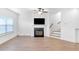 Spacious living room with fireplace and hardwood floors at 1958 Dillon Dr, Lithonia, GA 30058