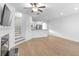 Spacious living room with fireplace and hardwood floors at 1958 Dillon Dr, Lithonia, GA 30058
