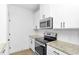 Modern kitchen with stainless steel appliances and granite countertops at 1958 Dillon Dr, Lithonia, GA 30058