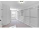 Large walk-in closet with ample hanging space and drawers at 1958 Dillon Dr, Lithonia, GA 30058