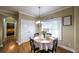 Bright breakfast nook features a table for four and hardwood floors at 9722 Fallview Ct, Villa Rica, GA 30180