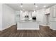 Open concept kitchen with island and granite countertops at 125 Overlook Ridge Way, Canton, GA 30114