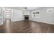 Living room with hardwood floors and a stone fireplace at 125 Overlook Ridge Way, Canton, GA 30114
