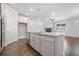 Open concept kitchen with large island and stainless steel appliances at 125 Overlook Ridge Way, Canton, GA 30114