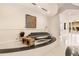 Modern lobby featuring a gray sectional sofa and unique wood side tables at 860 Peachtree Ne St # 1903, Atlanta, GA 30308