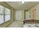 Bedroom with double bed, double doors to closet and hallway access at 3191 Lake Mcginnis Dr, Suwanee, GA 30024
