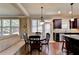 Eat-in kitchen with breakfast nook and access to backyard at 3191 Lake Mcginnis Dr, Suwanee, GA 30024