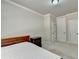Bright bedroom with double bed and two closets at 3191 Lake Mcginnis Dr, Suwanee, GA 30024