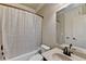 Clean bathroom with tub shower and granite vanity at 3191 Lake Mcginnis Dr, Suwanee, GA 30024