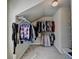 Large walk-in closet with ample hanging space and shelving at 3191 Lake Mcginnis Dr, Suwanee, GA 30024