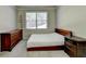 Spacious bedroom with a double dresser and neutral decor at 3191 Lake Mcginnis Dr, Suwanee, GA 30024