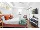 Bright bedroom with king bed, barn door, and stylish decor at 1696 Emerald Sw Ave, Atlanta, GA 30310