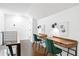 Home office featuring two desks and emerald green chairs at 1696 Emerald Sw Ave, Atlanta, GA 30310