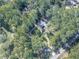 A house surrounded by lush green trees and easily accessible via road at 198 Oak Hill Cir, Canton, GA 30114