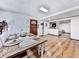 Rustic farmhouse dining table in a bright dining area with hardwood floors at 198 Oak Hill Cir, Canton, GA 30114