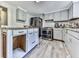 Modern kitchen features stainless steel appliances and an island with butcher block top at 198 Oak Hill Cir, Canton, GA 30114