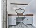 Charming bathroom vanity with unique mirror and built-in storage at 198 Oak Hill Cir, Canton, GA 30114