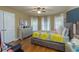 Bright bedroom with a queen bed and plenty of natural light at 1896 Alcovy Bluff Way, Lawrenceville, GA 30045