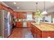 Spacious kitchen featuring stainless steel appliances and granite countertops at 1896 Alcovy Bluff Way, Lawrenceville, GA 30045