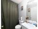Clean bathroom with a shower/tub combo and white vanity at 253 Gallant Se # 17, Mableton, GA 30126