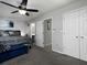 Main bedroom with king bed, walk-in closet, and en-suite bathroom access at 253 Gallant Se # 17, Mableton, GA 30126
