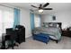 Spacious main bedroom with king-size bed, ceiling fan, and home office area at 253 Gallant Se # 17, Mableton, GA 30126