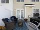 Cozy patio with seating area and fire pit for entertaining at 253 Gallant Se # 17, Mableton, GA 30126