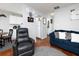 Open living room with hardwood floors, comfortable seating and kitchen views at 253 Gallant Se # 17, Mableton, GA 30126