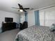 Main bedroom featuring a king-size bed, workspace, and ample closet space at 253 Gallant Se # 17, Mableton, GA 30126