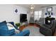 Comfortable living room with hardwood floors, fireplace and seating at 253 Gallant Se # 17, Mableton, GA 30126